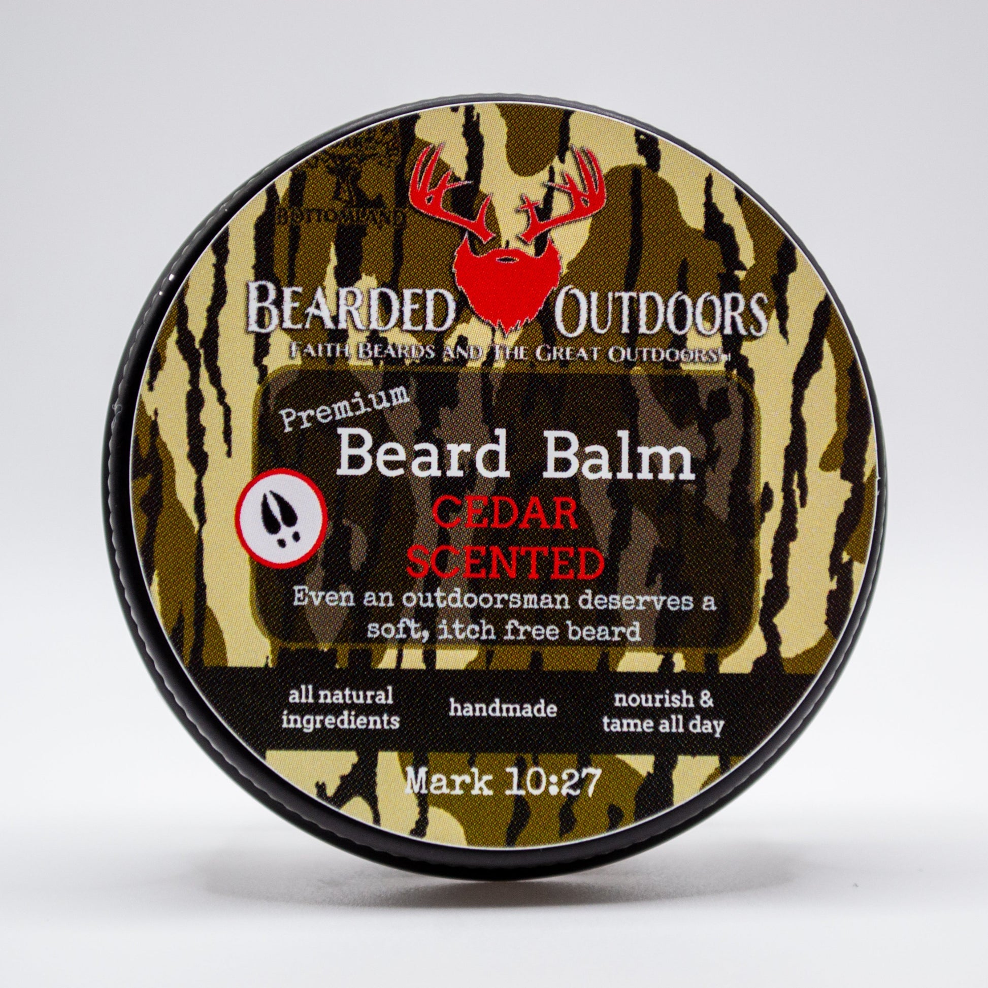 Premium beard balm tin with Mossy Oak Bottomland matte finish displaying Bearded Outdoors USA logo